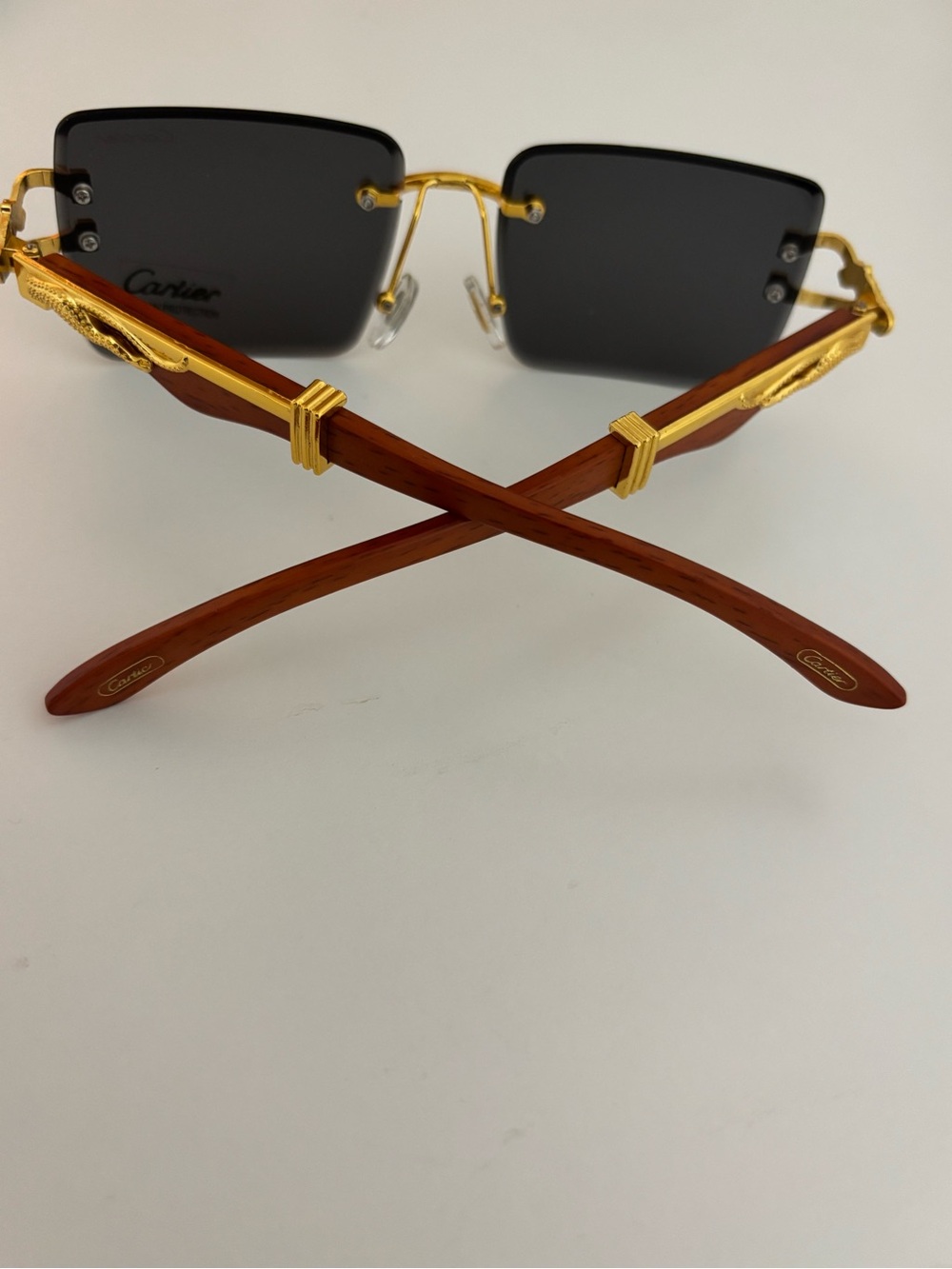 Cartier Men’s Gold Frame Sunglasses with Black Lenses and Brown Temples